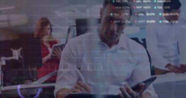 Animation of stock market data processing over caucasian man taking notes at office. Global economy and business technology concept