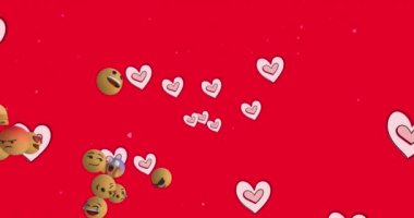 Kırmızı arka planda yüzen birden fazla pembe kalp simgesi ve yüz ifadelerinin animasyonu. Sosyal medya ağ teknolojisi kavramı