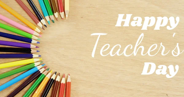Image of happy teachers day text over pencils. school, education and study concept digitally generated image.