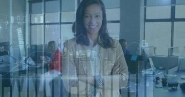 Animation of financial data processing over biracial businesswoman in office. Global business, finances, computing and data processing concept digitally generated video.