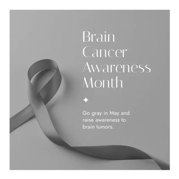 Composition of brain cancer awareness month text over ribbon on grey background. Brain cancer awareness month concept digitally generated image.