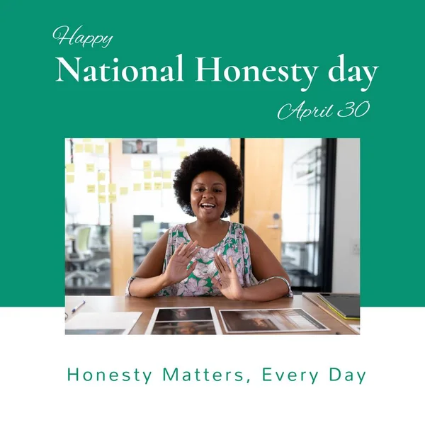 Happy national honesty day and april 30 text over african american woman with photographs on table. Composite, honesty matters, every day, holiday, encourage, trust, communication, relations concept.