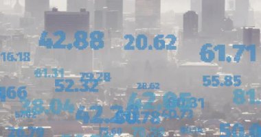 Animation of financial data processing over cityscape. Global business, finances, computing and data processing concept digitally generated video.