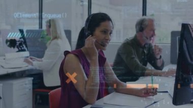 Animation of data processing over diverse business people working in office. Global business, finances, computing and data processing concept digitally generated video.