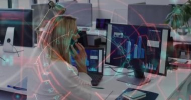 Animation of data processing over caucasian businesswoman working in office. Global business, finances, computing and data processing concept digitally generated video.