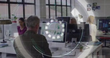 Animation of financial data processing over diverse business people working in office. Global business, finances, computing and data processing concept digitally generated video.