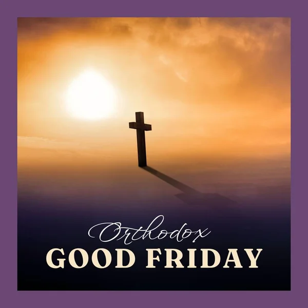 Image of good friday text over landscape with sun and cross. Good friday and celebration concept digitally generated image.