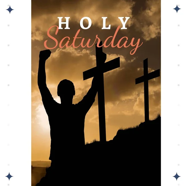 Image of holy saturday text over silhouette of man raising hands and crosses. Holy saturday and celebration concept digitally generated image.