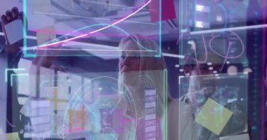 Animation of data processing over diverse business people. Global business, finances, computing and data processing concept digitally generated video.