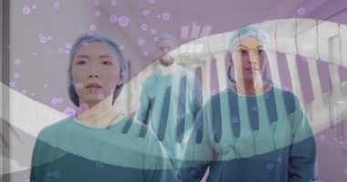 Hastanedeki çeşitli doktorlar üzerinde DNA ipliği ve veri işleme animasyonu. Küresel tıp, sağlık, dijital arayüz, bilgisayar ve veri işleme kavramı dijital olarak oluşturulmuş video.