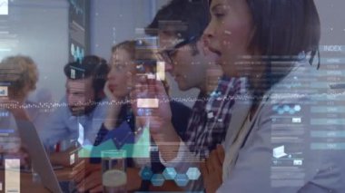 Animation of financial data processing over diverse business people. Global business, finances, computing and data processing concept digitally generated video.