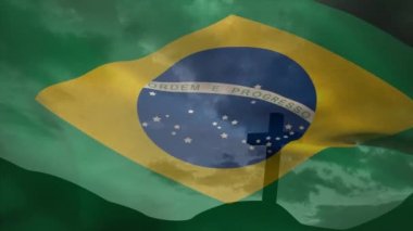 Bir dağda çapraz çarmıha gerilme siluetine karşı Brezilya bayrağı sallamanın animasyonu. Ulusal din kavramı
