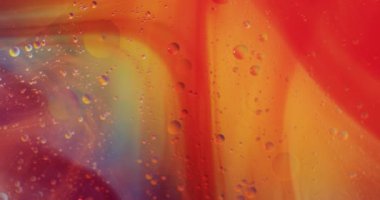 Fotokopi alanı ile turuncu arkaplanda hareket eden baloncuk animasyonu. Desen, hareket ve renk konsepti dijital olarak oluşturulmuş video.