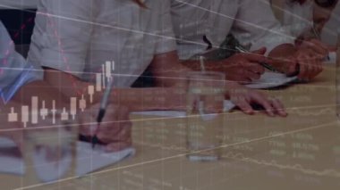 Animation of financial data processing over diverse business people. Global business, finances, computing and data processing concept digitally generated video.