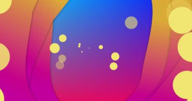 Sarı noktaların animasyonu ve mavi arka planda pürüzsüz döngü üzerinde hareket eden çok renkli desenler. Soyut, renkli ve şablon konsepti dijital olarak oluşturulmuş video.