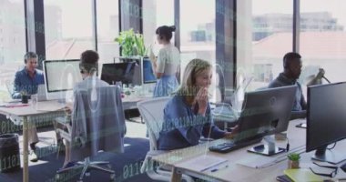 Animation of icons and data processing over diverse business people in office. Global business, finances, computing and data processing concept digitally generated video.