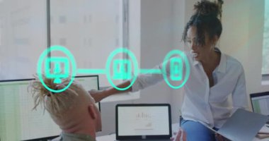 Animation of icons and data processing over diverse business people in office. Global business, finances, computing and data processing concept digitally generated video.