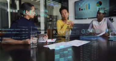 Animation of financial data processing over diverse business people in office. Global business, finances, computing and data processing concept digitally generated video.