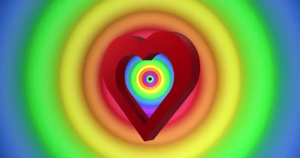 虹色の円や色の上に赤いハートのアニメーションがシームレスなループに移動します プライド月 Lgbtq 人権と平等の概念デジタル生成されたビデオ — ストック動画