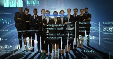 Animation of financial data processing over diverse business people. Global business, finances, computing and data processing concept digitally generated video.