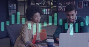 Animation of financial data processing over diverse business people using laptop. Global business, finances, computing and data processing concept digitally generated video.