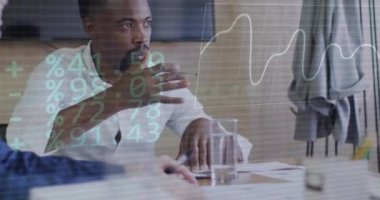 Animation of data processing over diverse business people in office. Global business, finances, computing and data processing concept digitally generated video.