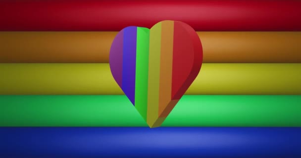 虹色のストライプや色の上に虹の心のアニメーションがシームレスなループに移動します プライド月 Lgbtq 人権と平等の概念デジタル生成されたビデオ — ストック動画