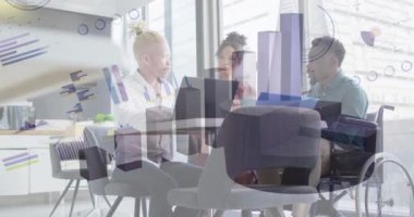 Animation of data processing over diverse business people in office. Global business, finances, computing and data processing concept digitally generated video.