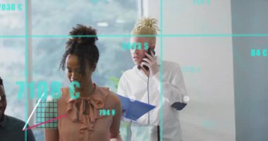 Animation of data processing over diverse business people in office. Global business, finances, computing and data processing concept digitally generated video.