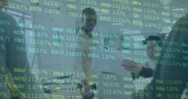 Animation of financial data processing over diverse business people in office. Global business, finances, computing and data processing concept digitally generated video.