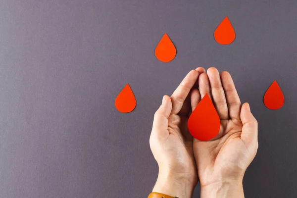 Hands Caucasian Woman Cupping Blood Drop Blood Drops Grey Background — Stock Photo, Image