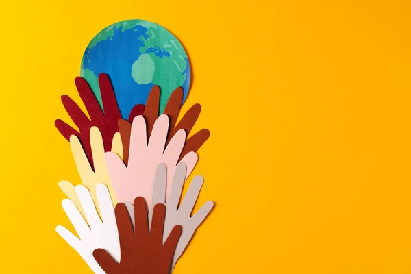 Paper Cut Out Multi Coloured Hands Globe Copy Space Yellow — Stock Photo, Image