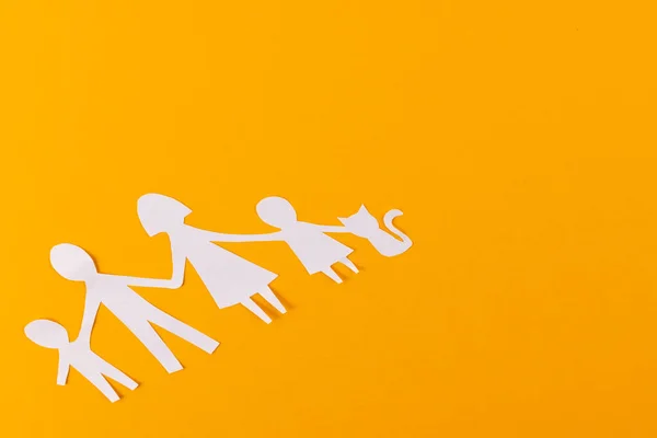 White Paper Cut Out Family Two Children Copy Space Orange — Stock Photo, Image