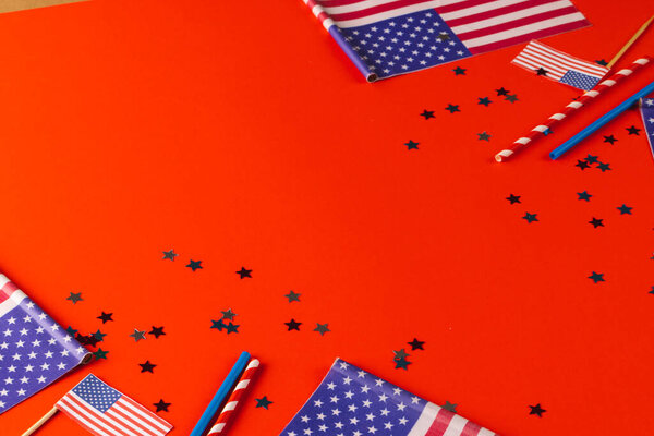 Red, blue and white stars and flags of united states of america with copy space on red background. American patriotism, independence day and tradition concept.