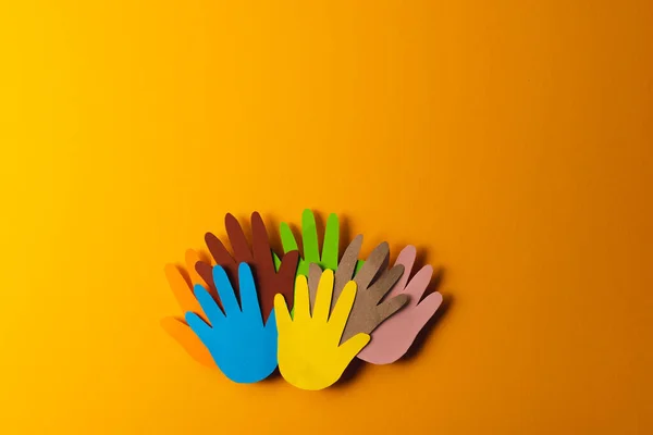 Close Paper Cut Out Multi Coloured Hands Copy Space Orange — Stock Photo, Image