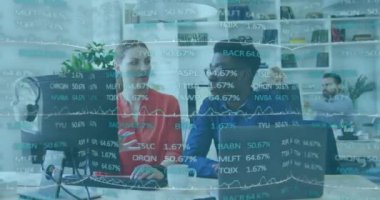 Animation of financial data processing over diverse business people in office. Global business, finances, computing and data processing concept digitally generated video.