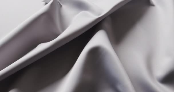 以慢动作紧贴灰色闪亮的丝绸布 布和材料 — 图库视频影像