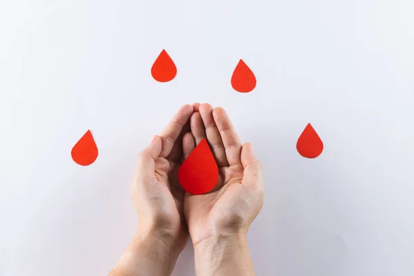 Hands Caucasian Woman Cupping Blood Drop Blood Drops White Background — Stock Photo, Image