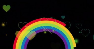 Siyah arka planda gökkuşağı üzerinde gökkuşağı kalplerinin animasyonu. Gurur ayı, lgbtq, insan hakları ve eşitlik kavramı dijital olarak oluşturulmuş video.