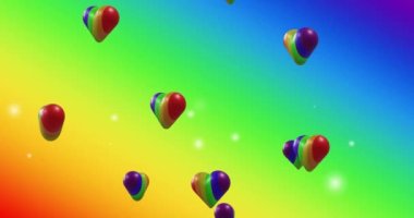 Gökkuşağı arka planında gökkuşağı kalplerinin animasyonu. Gurur ayı, lgbtq, insan hakları ve eşitlik kavramı dijital olarak oluşturulmuş video.