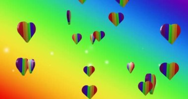 Gökkuşağı arka planında gökkuşağı kalplerinin animasyonu. Gurur ayı, lgbtq, insan hakları ve eşitlik kavramı dijital olarak oluşturulmuş video.