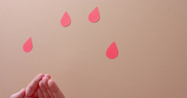 Hands Caucasian Woman Holding Blood Drop Drops Beige Background Slow — Stock Video