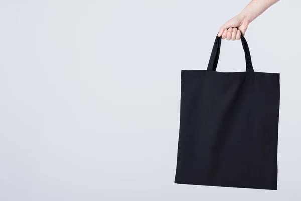 Hand Caucasian Woman Holding Black Canvas Bag Copy Space White — Stock Photo, Image