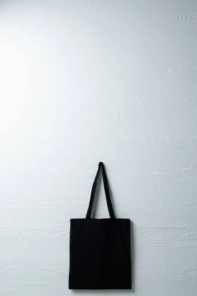 Hanging Black Canvas Bag White Wall Background Copy Space Eco — Stock Photo, Image