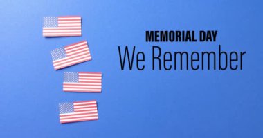 Anma Günü metninin mavi arka planda Amerika Birleşik Devletleri bayrakları üzerinde canlandırılması. Amerikan bağımsızlığı, gelenek ve kutlama konsepti dijital olarak oluşturulmuş video.