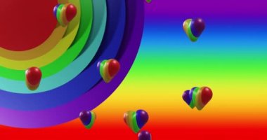 Gökkuşağı arka planında gökkuşağı kalplerinin animasyonu. Gurur ayı, lgbtq, insan hakları ve eşitlik kavramı dijital olarak oluşturulmuş video.