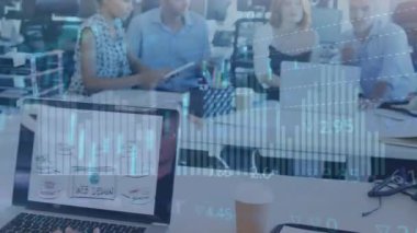 Animation of financial data processing over diverse business people in office. Global business, finances, computing and data processing concept digitally generated video.