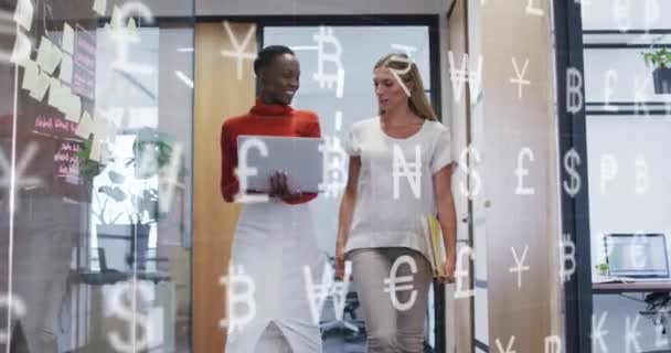 Animation Currency Symbols Two Diverse Women Discussing Laptop Office Global — Stock Video