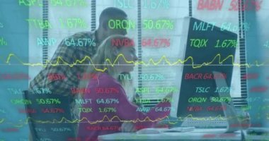Animation of financial data processing over diverse business people in office. Global business, finances, computing and data processing concept digitally generated video.