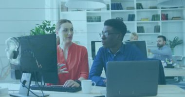 Animation of financial data processing over diverse business people in office. Global business, finances, computing and data processing concept digitally generated video.